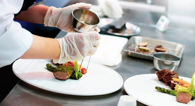 Chef preparing food, meal, in the kitchen, chef cooking, Chef decorating dish, closeup